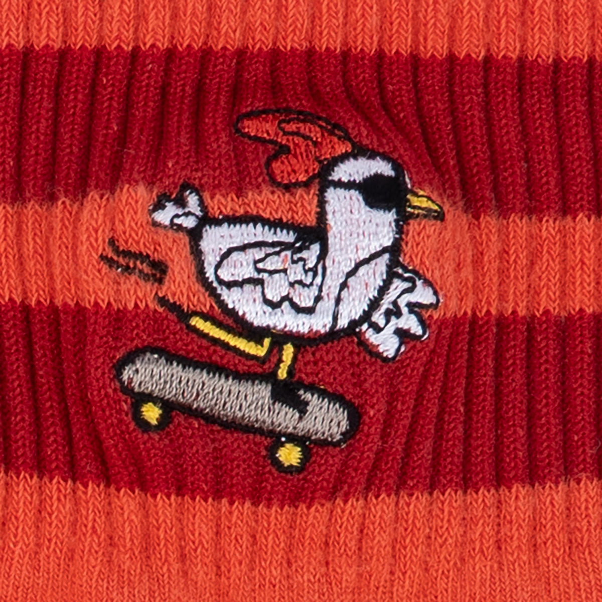 Rad Chicken quarter socks – close-up detail of skateboarding chicken print