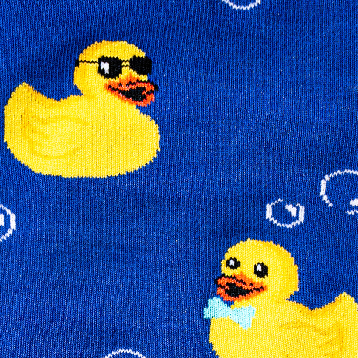 Rubber Duckie knee high socks – close-up detail of duck pattern